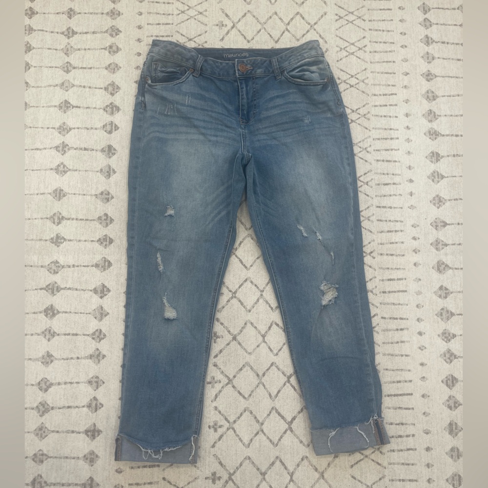 Maurice’s size 11/12 light wash denim jeans with frayed areas